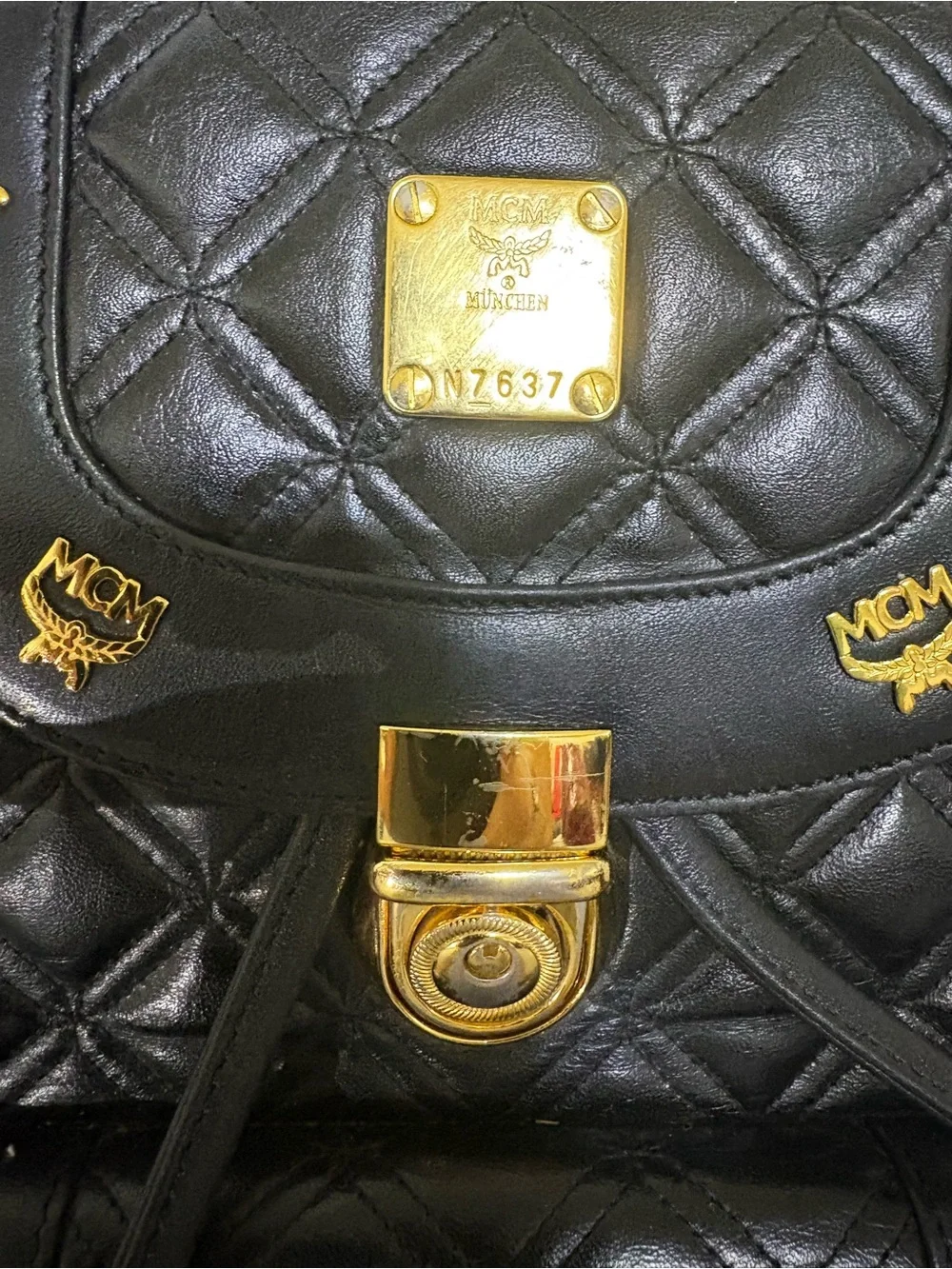 MCM Black Quilted Leather Mini Backpack with Gold Accents
